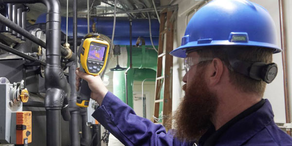 Student using Voltcraft oscilloscope